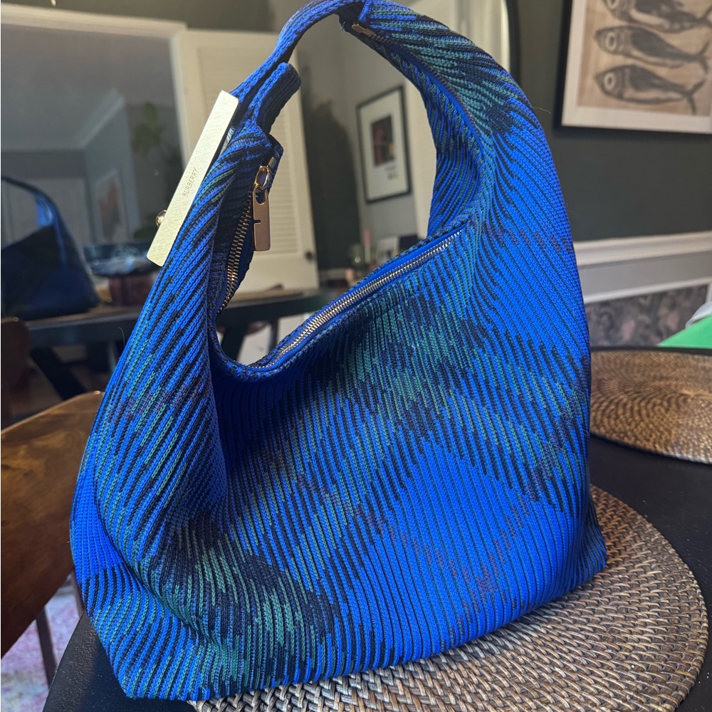Burberry Blue 
Peg checked shoulder bag